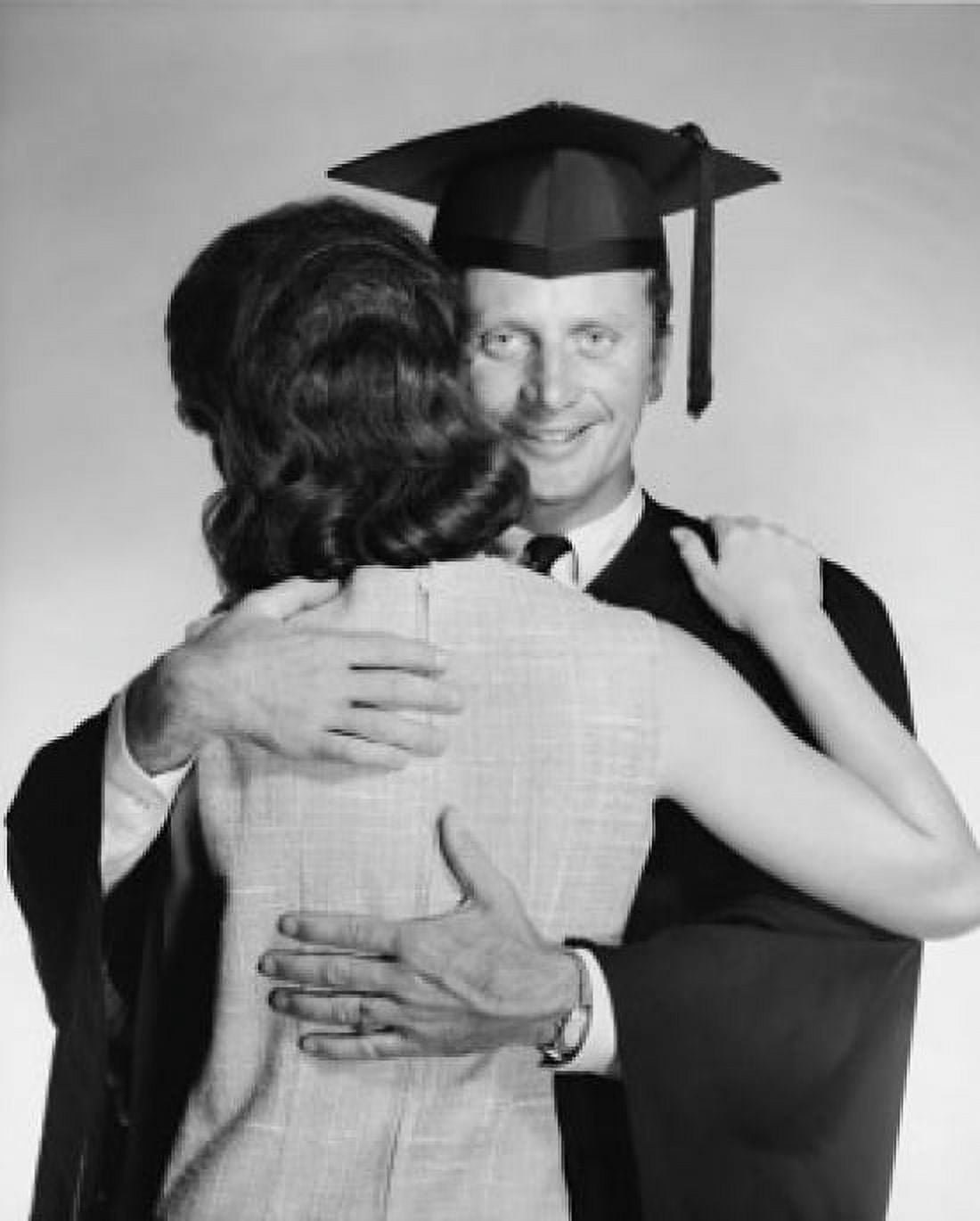 Close-up of a mid adult male graduate embracing a woman Canvas Art - (18 x 24)