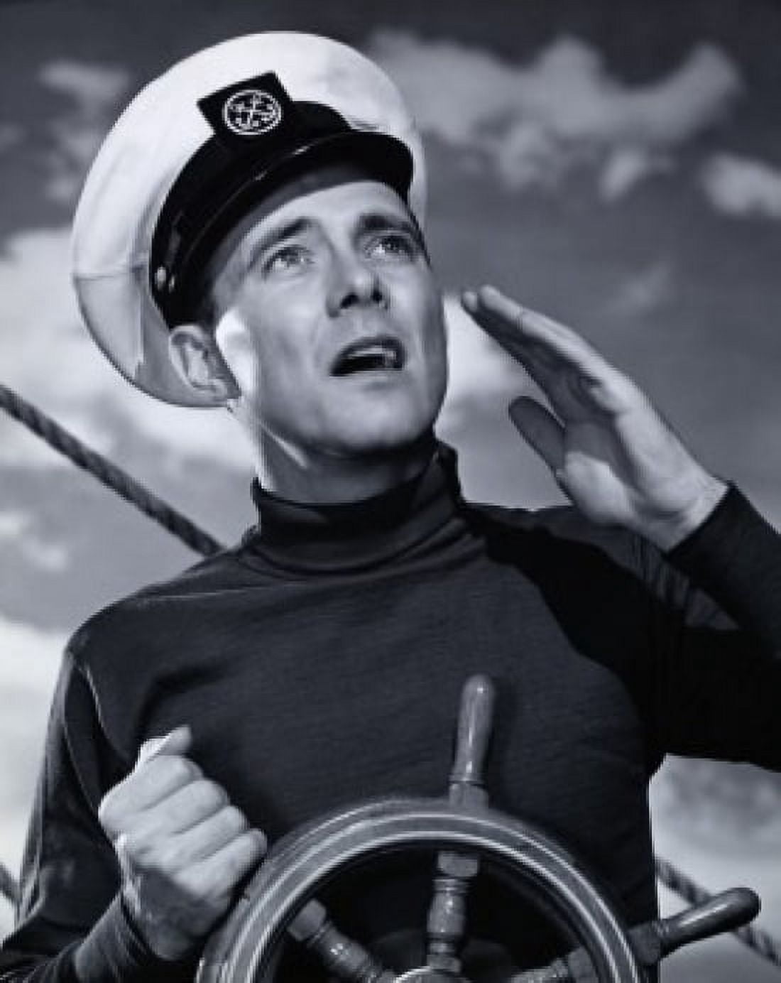 Close-up of a mid adult man holding the helm of a sailboat and shouting Canvas Art - (18 x 24)