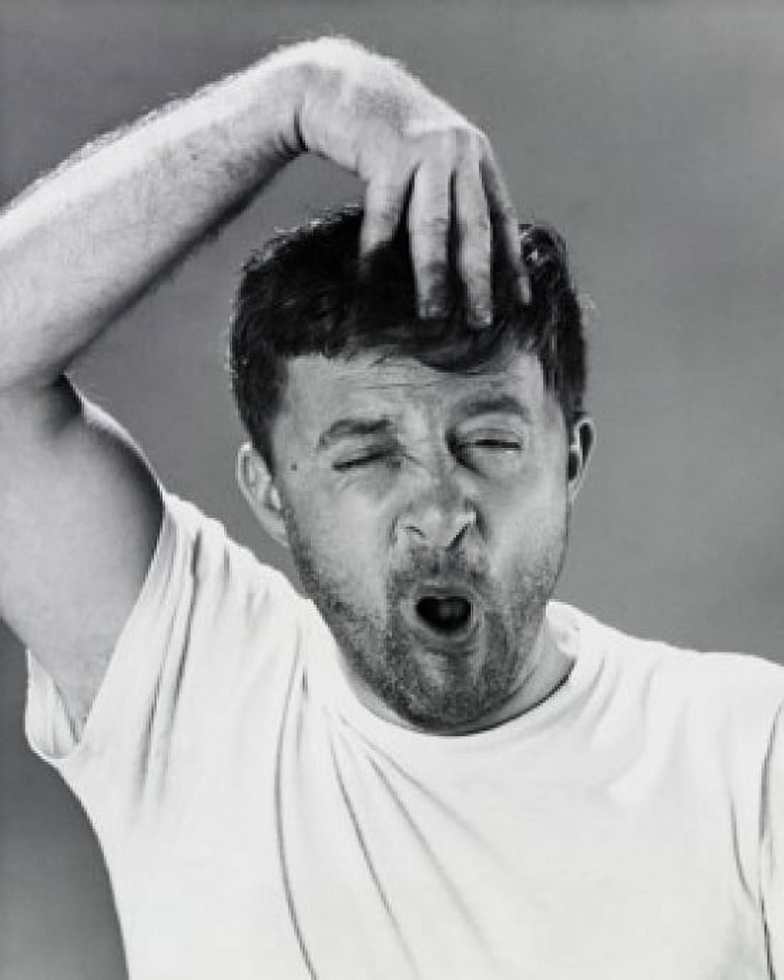 Close-up of a mid adult man suffering from a headache Canvas Art - (18 x 24)