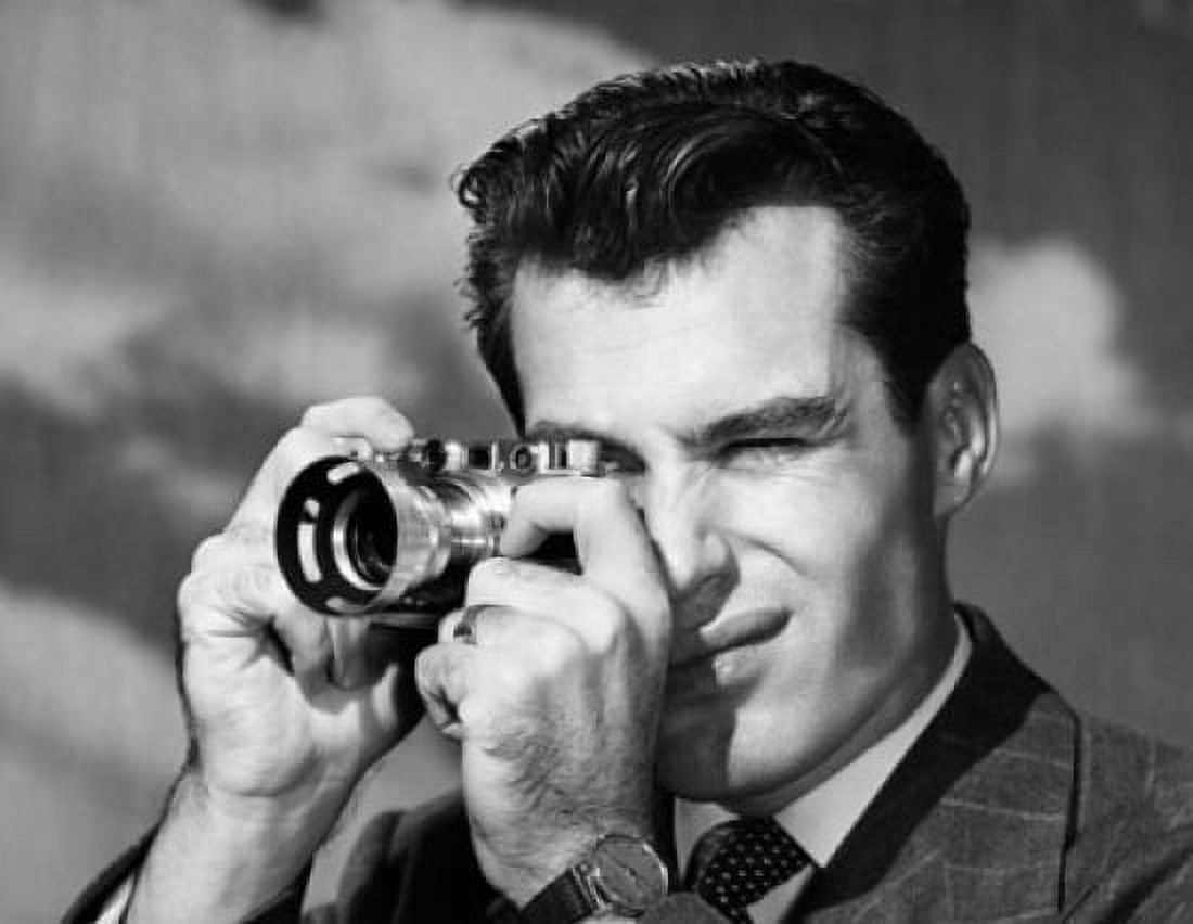 Close-up of a mid adult man taking a photograph Canvas Art - (24 x 36)