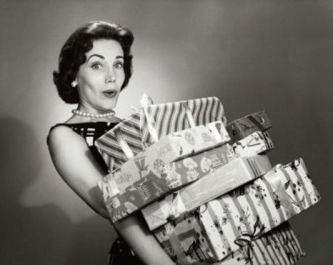 Close-up of a mid adult woman carrying a stack of gifts Canvas Art - (18 x 24)