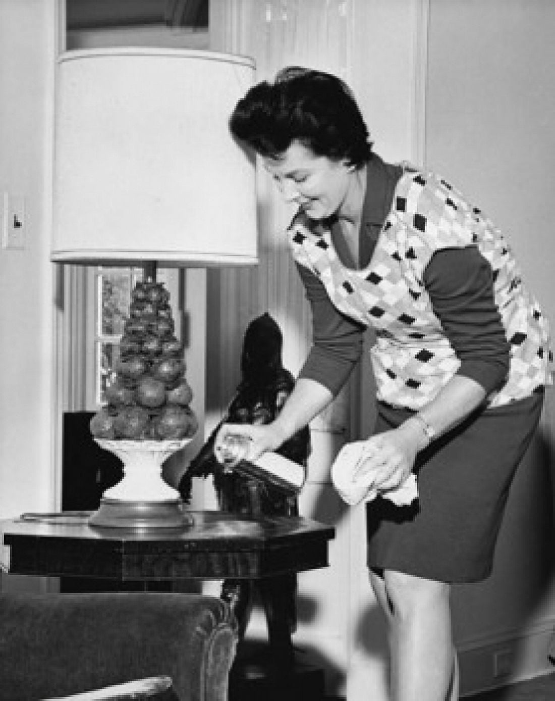 Close-up of a mid adult woman cleaning a coffee table Canvas Art - (18 x 24)