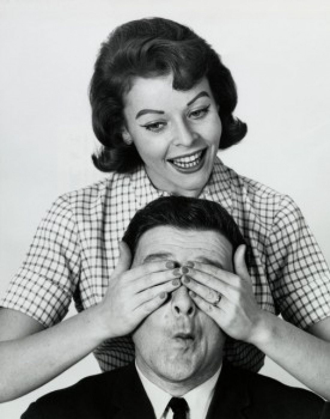 Close-up of a mid adult woman covering a mid adult mans eyes Canvas Art - (18 x 24)