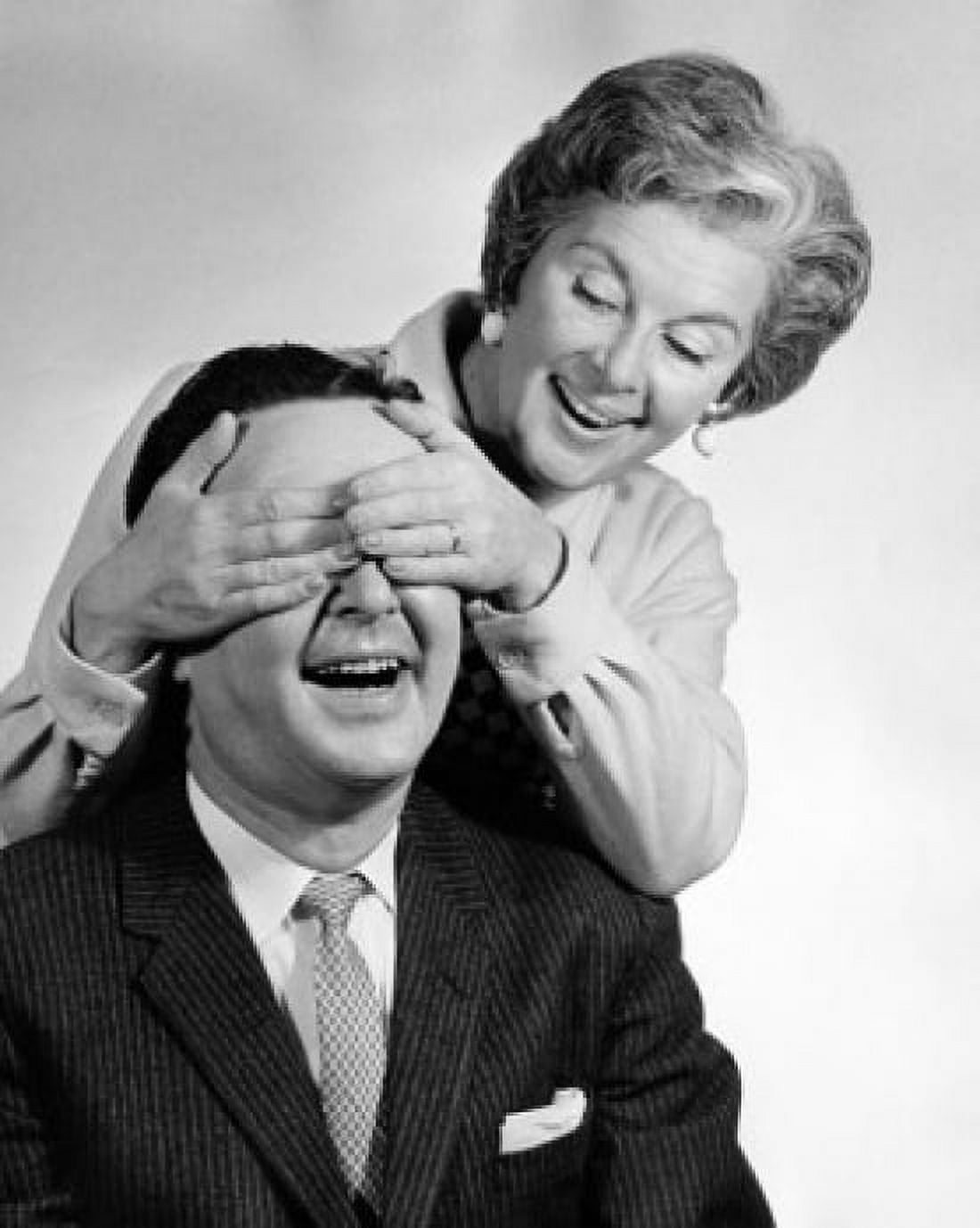 Close-up of a mid adult woman covering the eyes of a mid adult man Canvas Art - (24 x 36)