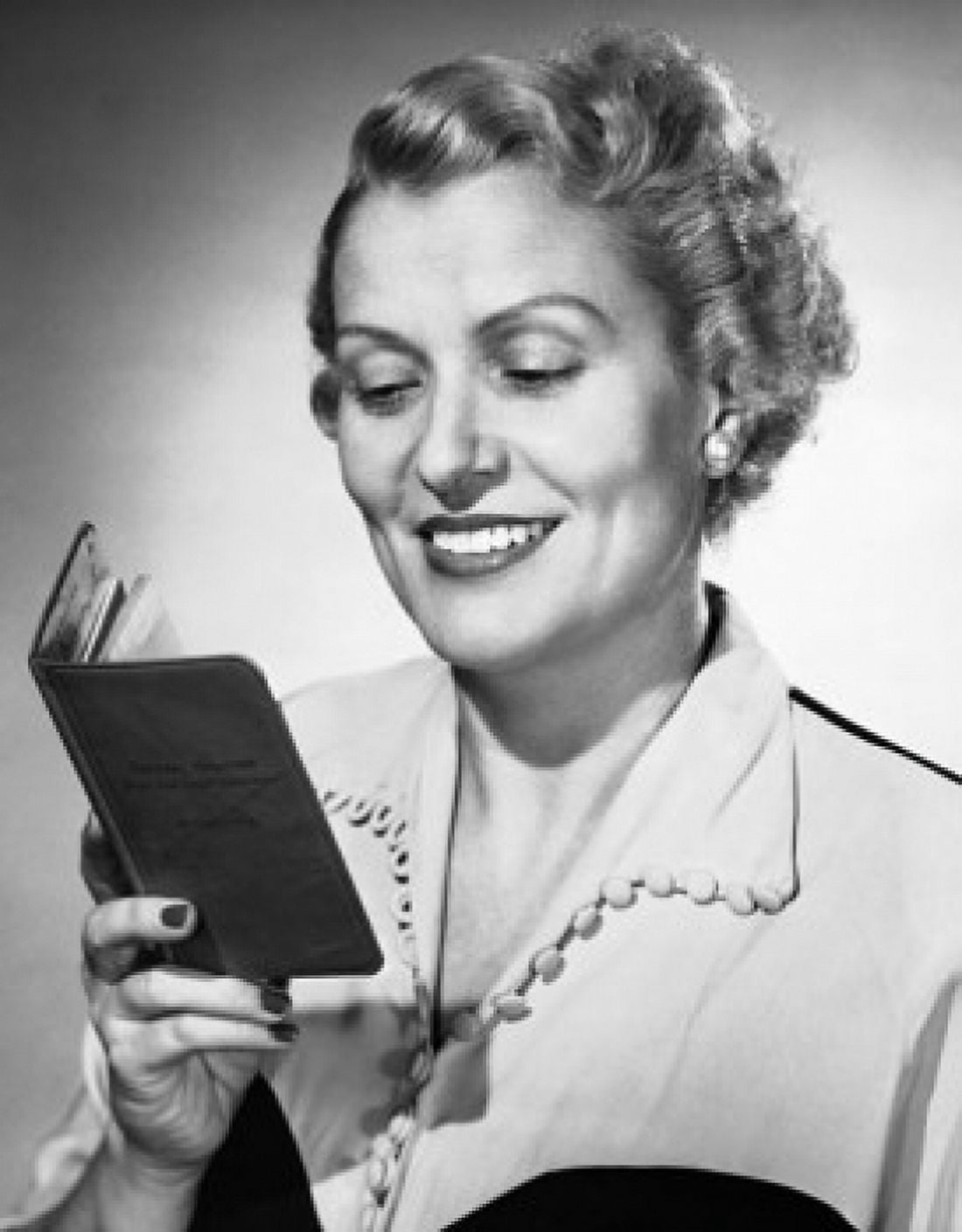 Close-up of a mid adult woman holding a bankbook Canvas Art - (18 x 24)