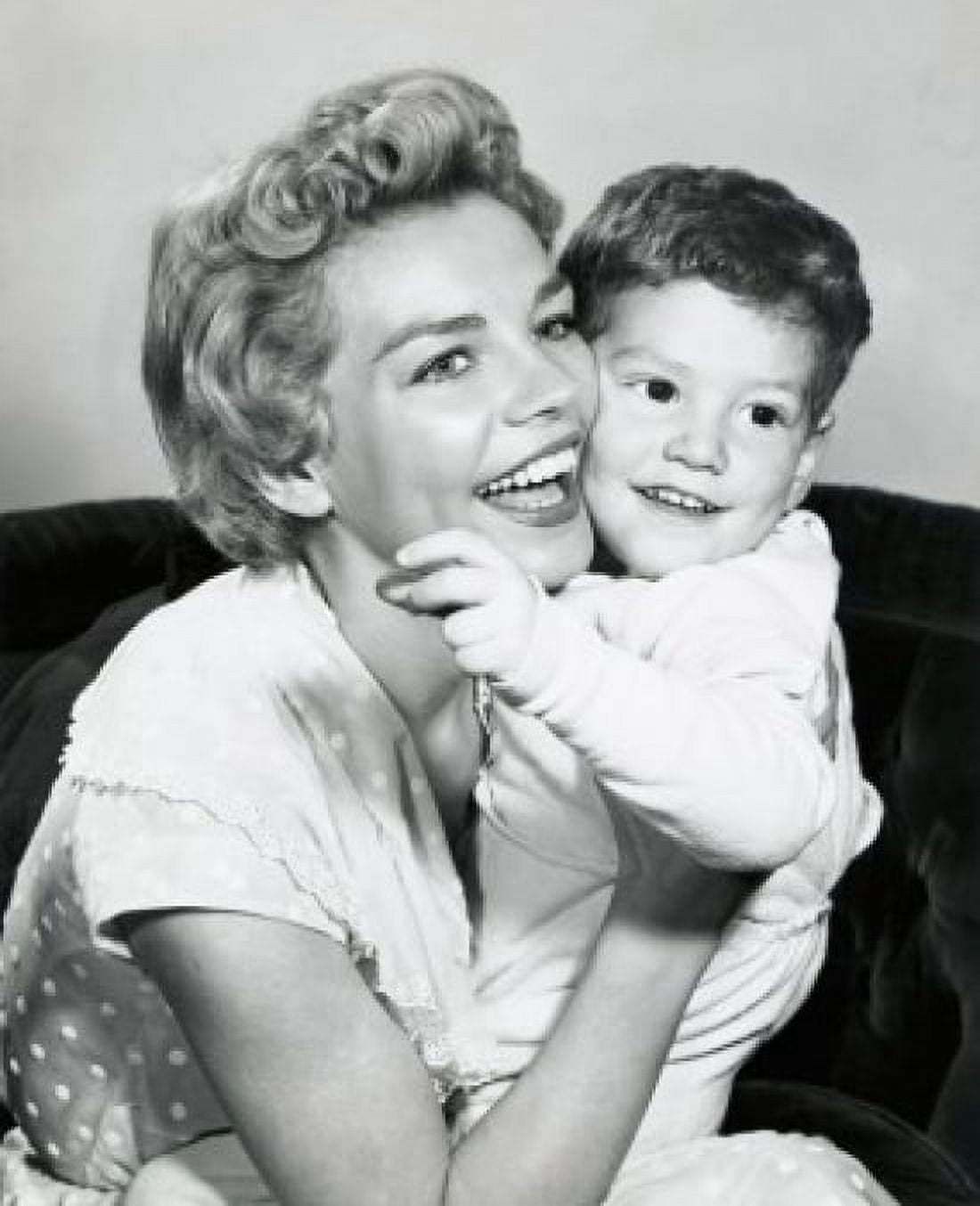Close-up of a mid adult woman holding her son and smiling Canvas Art - (24 x 36)