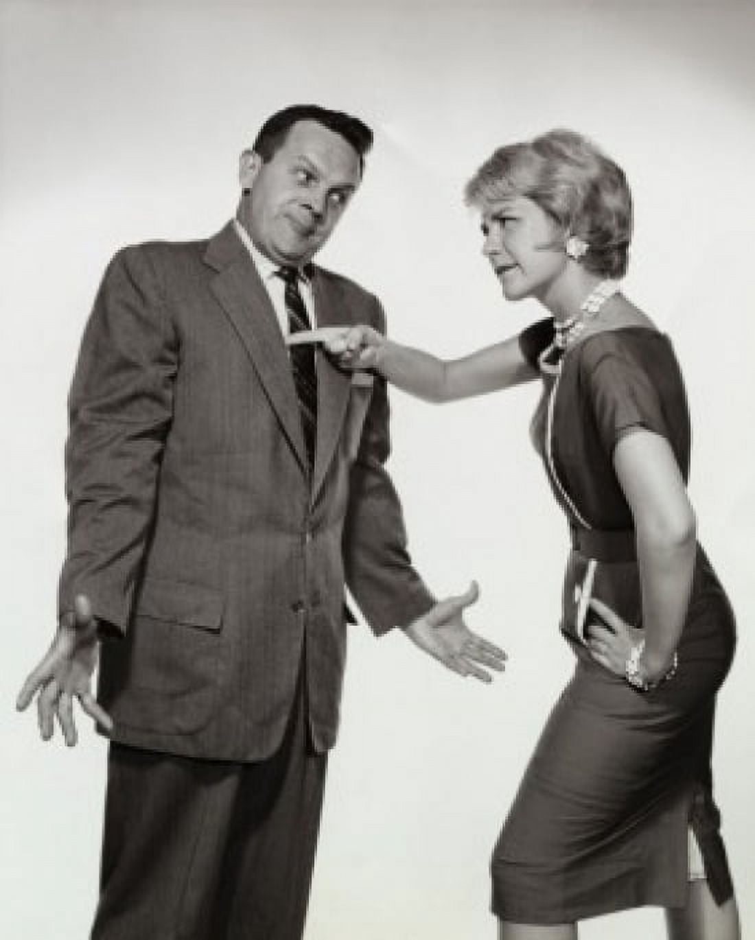 Close-up of a mid adult woman scolding at a mid adult man Canvas Art - (18 x 24)