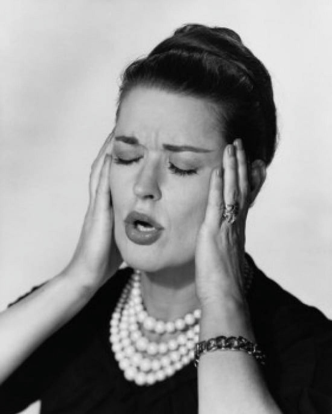 Close-up of a mid adult woman suffering from a headache Canvas Art - (18 x 24)