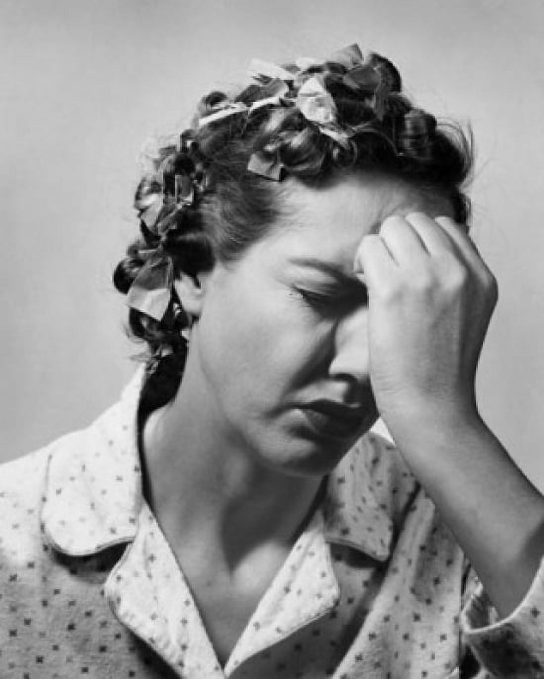 Close-up of a mid adult woman suffering from a headache Canvas Art - (18 x 24)