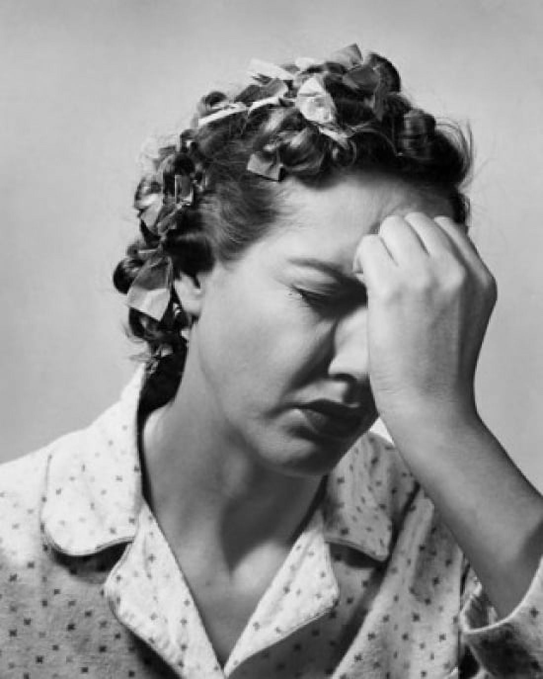 Close-up of a mid adult woman suffering from a headache Canvas Art - (24 x 36)