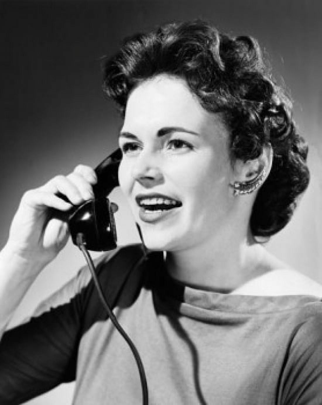 Close-up of a mid adult woman talking on the telephone Canvas Art - (18 x 24)