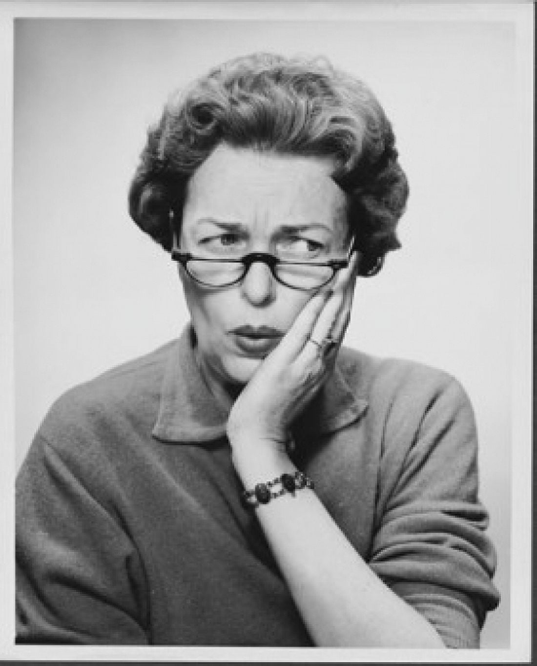 Close-up of a mid adult woman with her hand on her chin Canvas Art - (24 x 36)