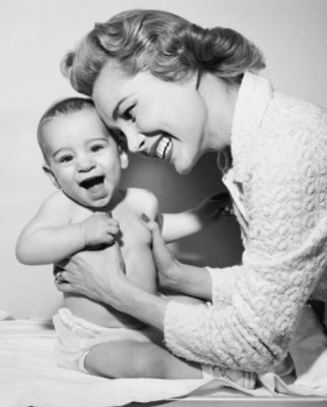 Close-up of a mother tickling her baby Canvas Art - (18 x 24)