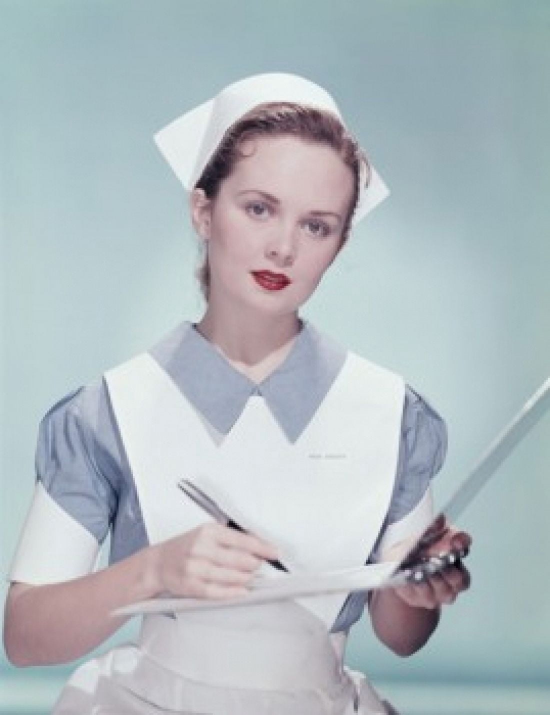 Close-up of a nurse writing on a clipboard Canvas Art - (24 x 36)