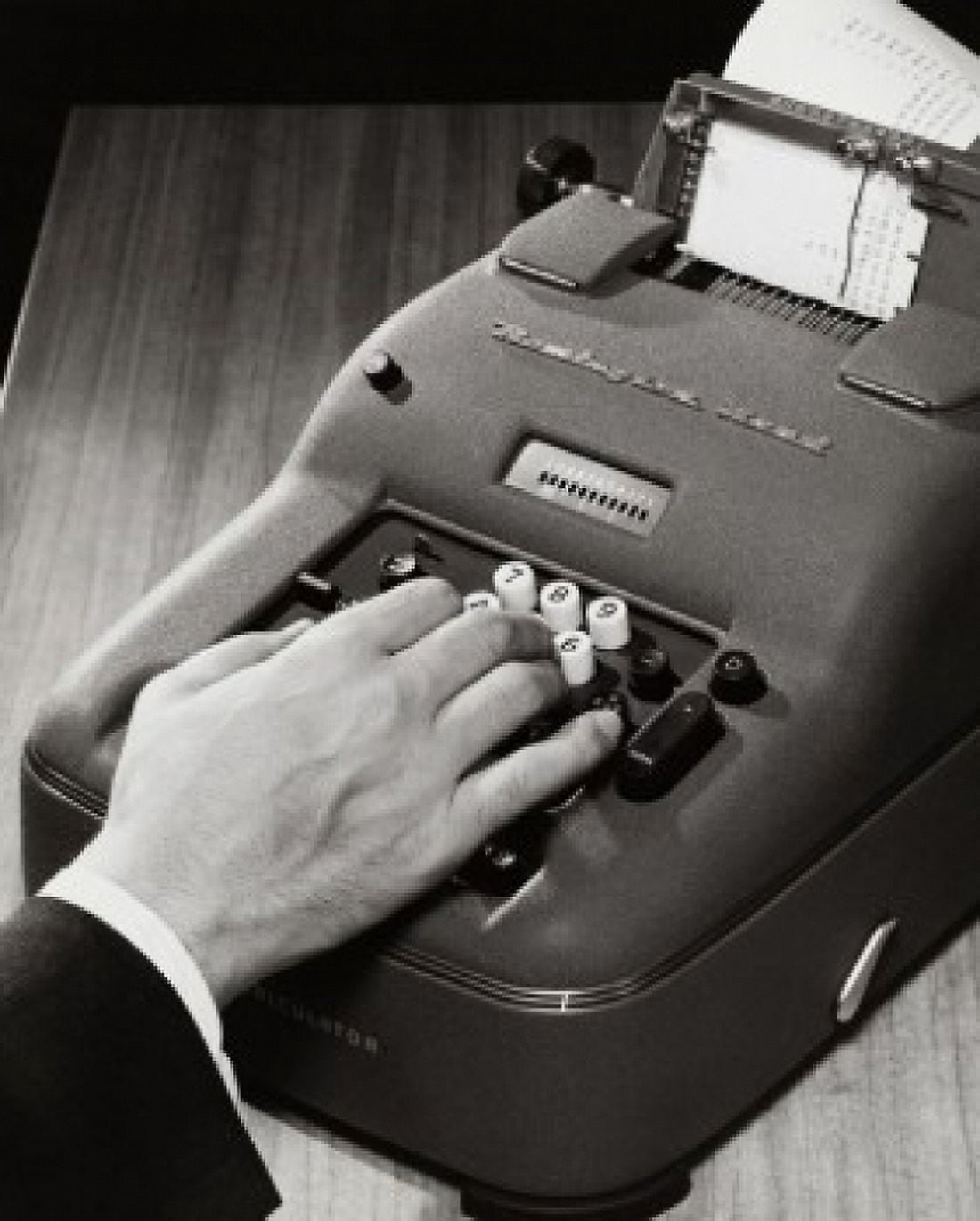 Close-up of a person operating an adding machine Canvas Art - (24 x 36)