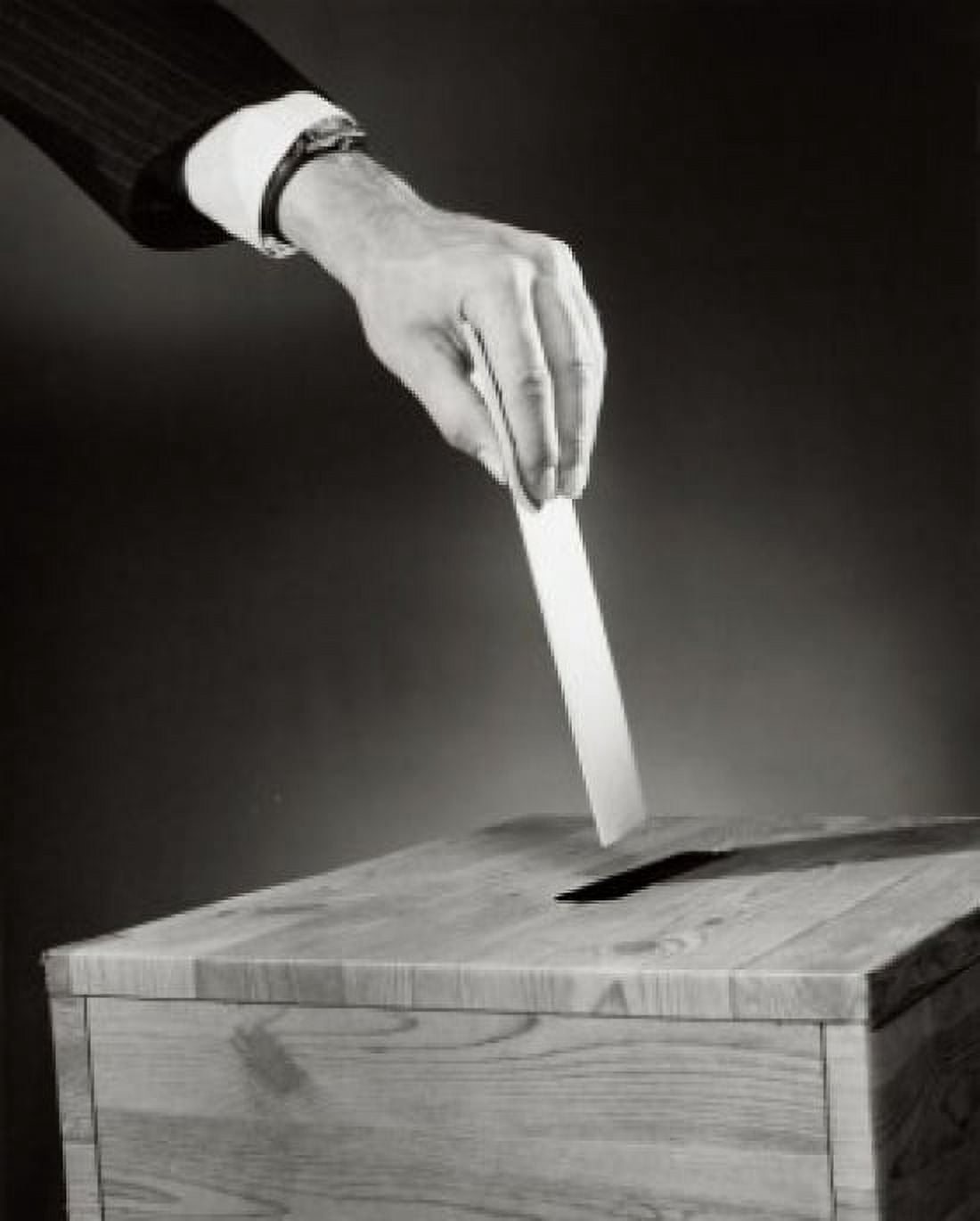Close-up of a persons hand dropping a ballot into a ballot box Canvas Art - (18 x 24)