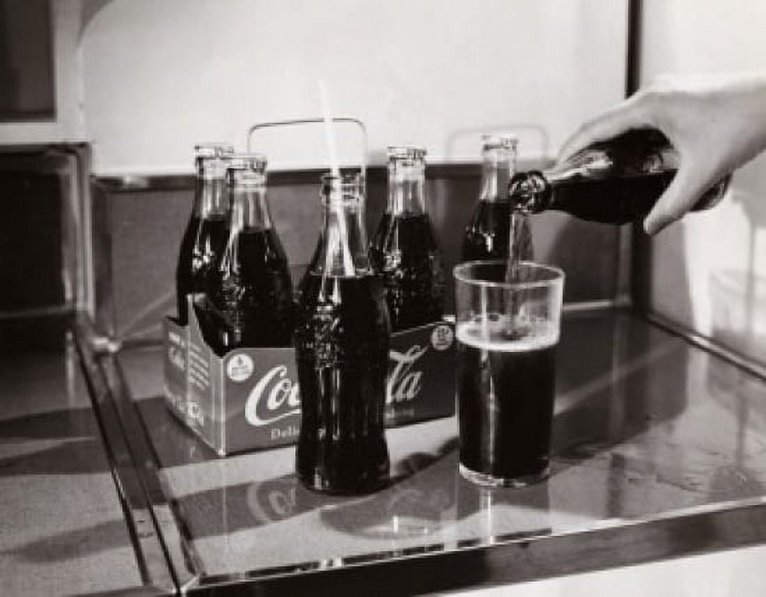 Close-up of a persons hand pouring soda into a glass Canvas Art - (18 x 24)