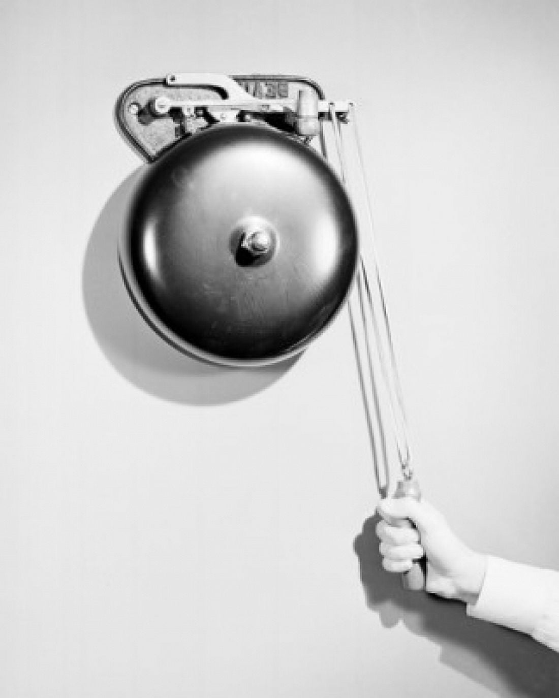 Close-up of a persons hand ringing a bell Canvas Art - (18 x 24)