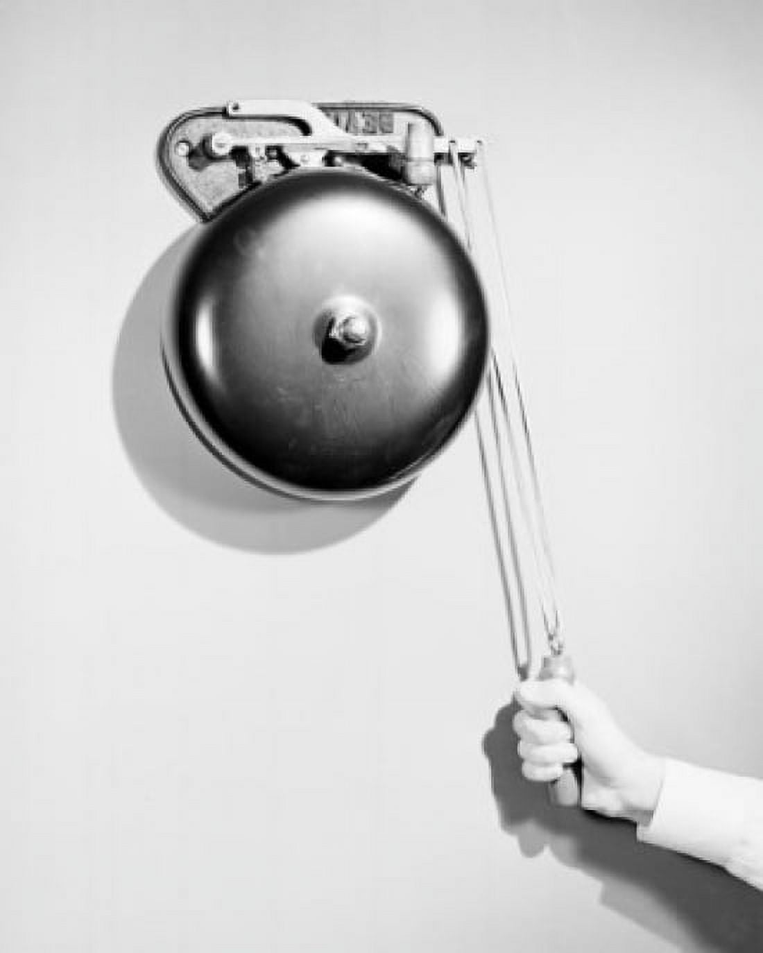 Close-up of a persons hand ringing a bell Canvas Art - (24 x 36)