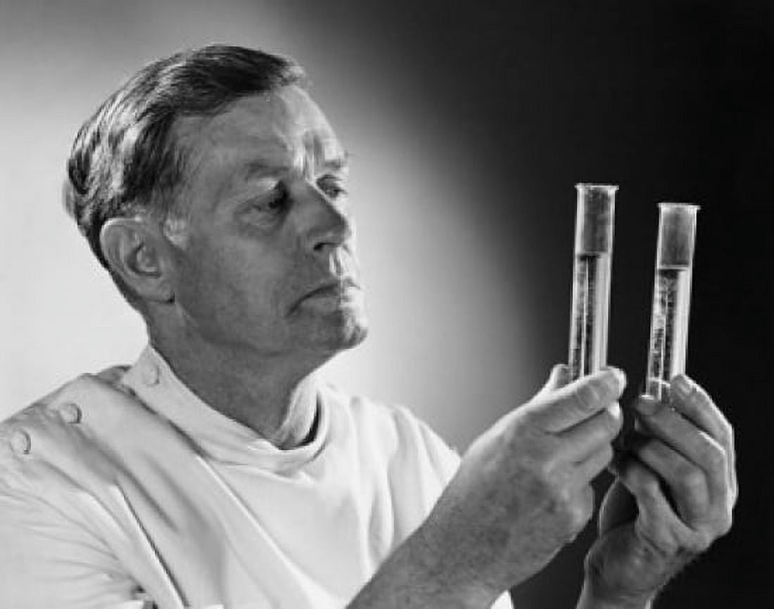 Close-up of a scientist comparing chemicals in two test tubes Canvas Art - (18 x 24)