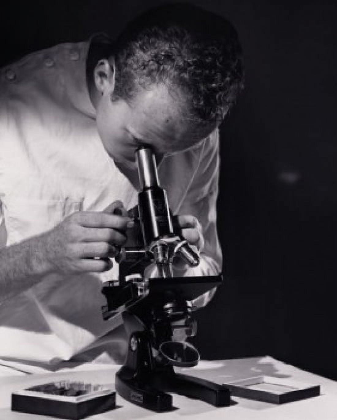 Close-up of a scientist looking through a microscope Canvas Art - (18 x 24)