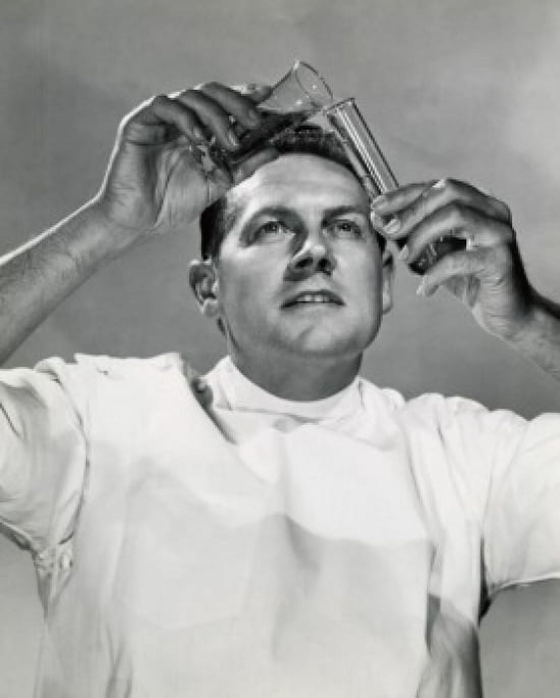 Close-up of a scientist pouring a chemical into a test tube Canvas Art - (18 x 24)