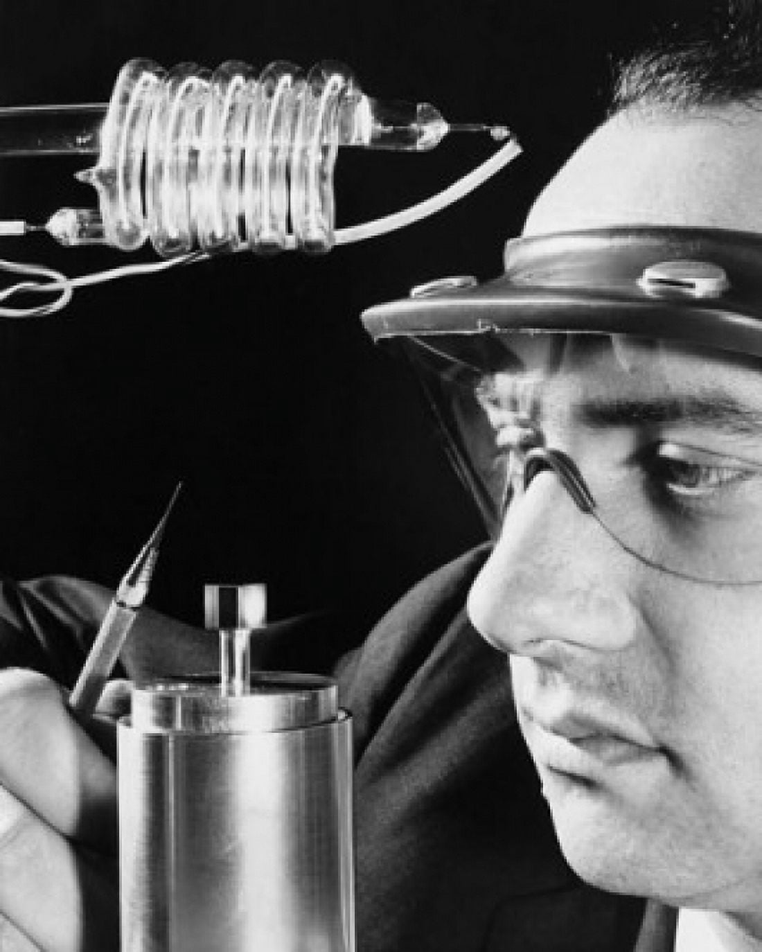Close-up of a scientist with a laser equipment Hughes Aircraft Culver City California USA Canvas Art - (18 x 24)