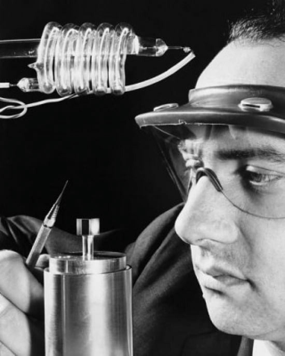 Close-up of a scientist with a laser equipment Hughes Aircraft Culver City California USA Canvas Art - (24 x 36)