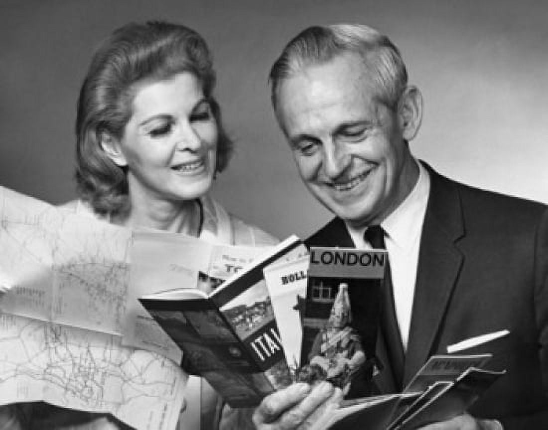 Close-up of a senior couple looking at brochures Canvas Art -  (18 x 24)