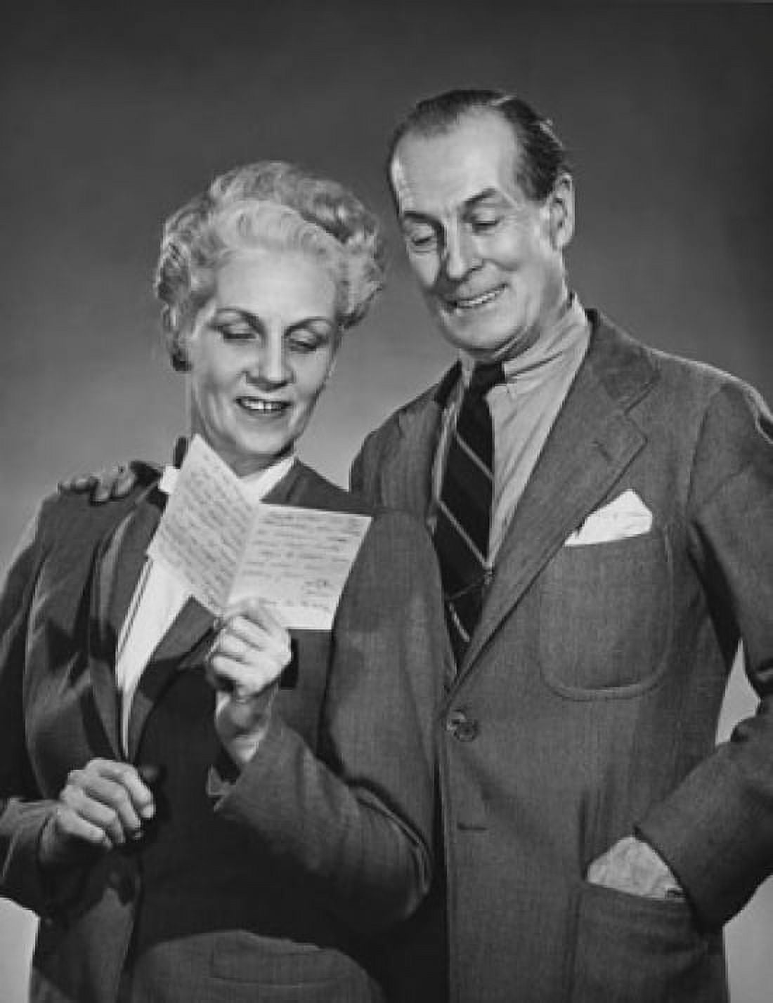 Close-up of a senior couple reading a letter Canvas Art - (18 x 24)