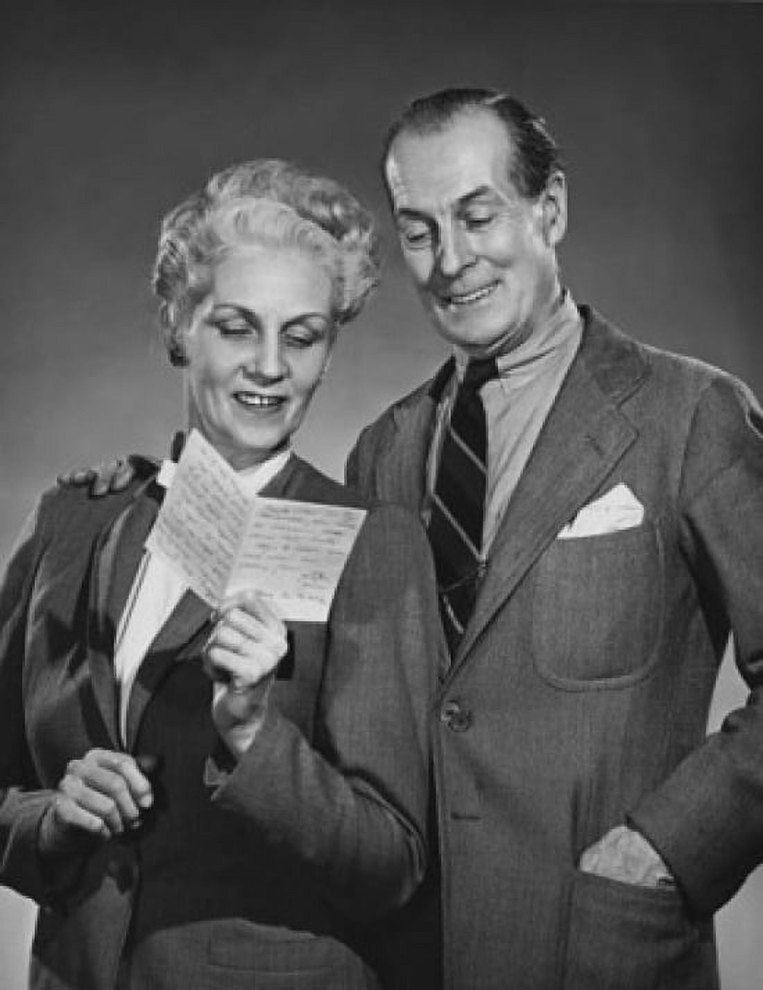 Close-up of a senior couple reading a letter Canvas Art - (24 x 36)