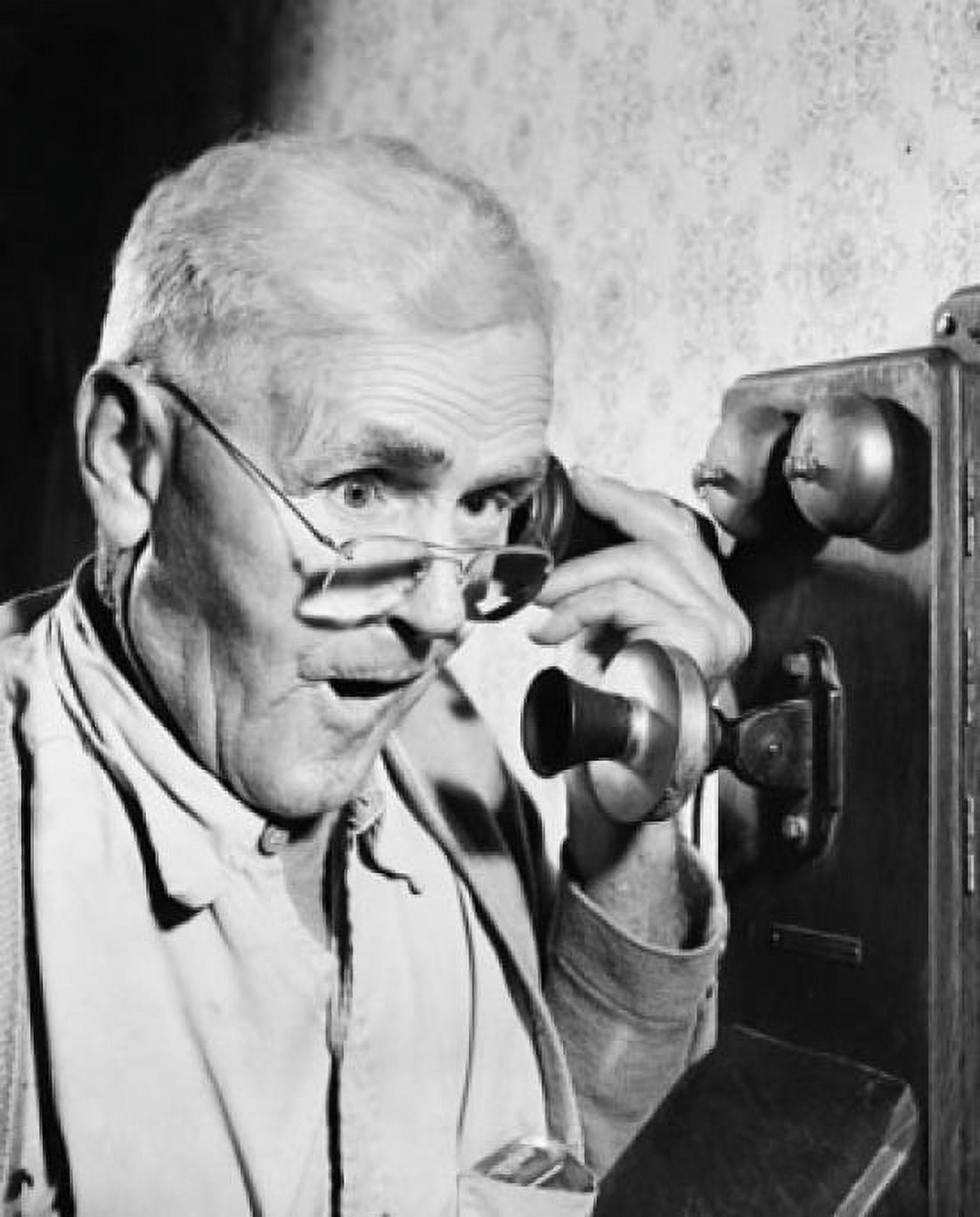 Close-up of a senior man talking on the telephone Canvas Art - (18 x 24)