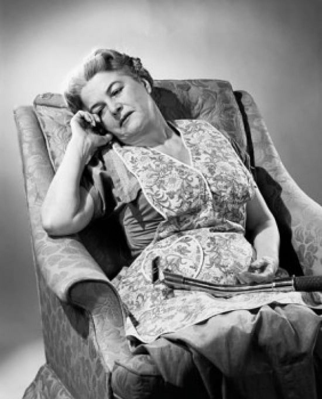 Close-up of a senior woman sleeping on an armchair Canvas Art - (18 x 24)