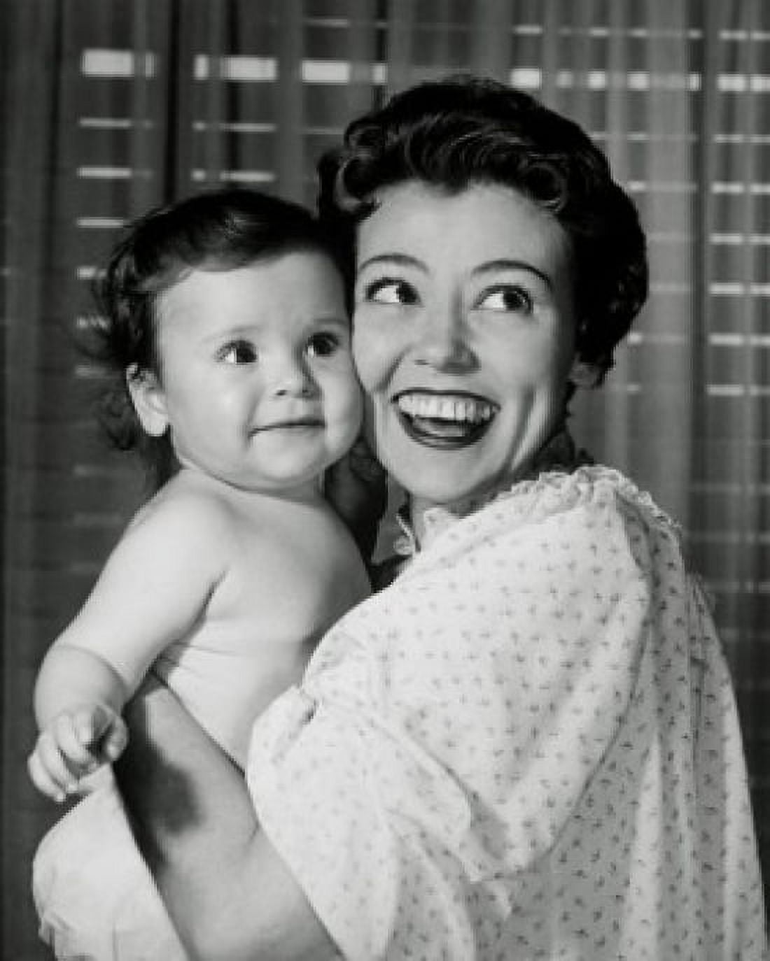 Close-up of a smiling mother holding her baby Canvas Art - (24 x 36)