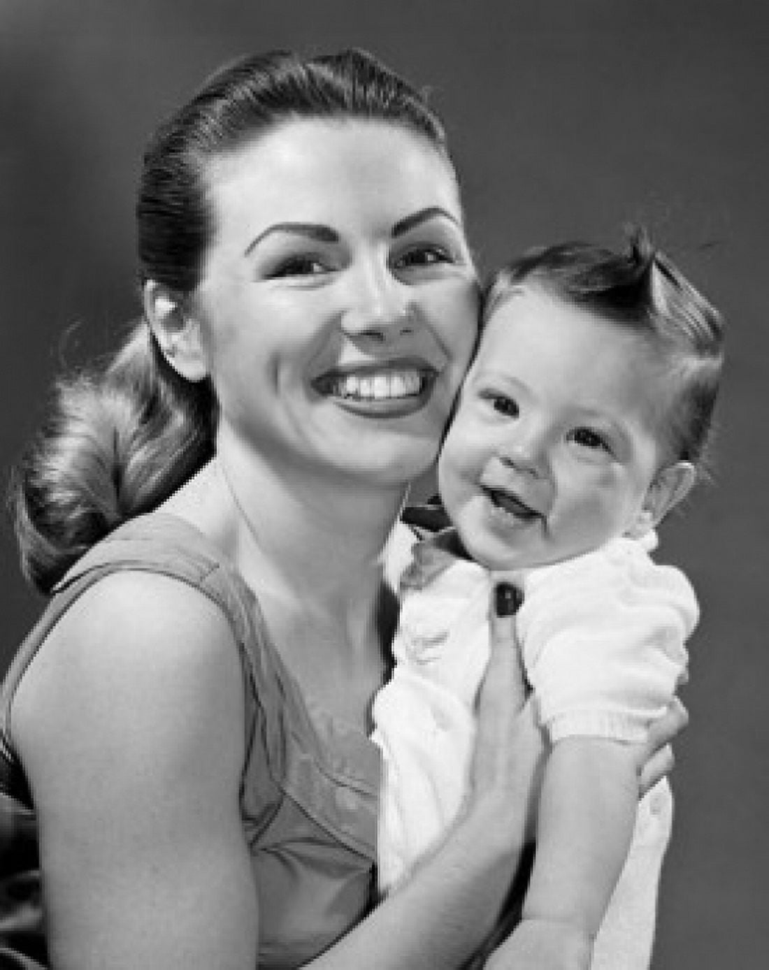 Close-up of a smiling mother holding her son Canvas Art - (18 x 24)