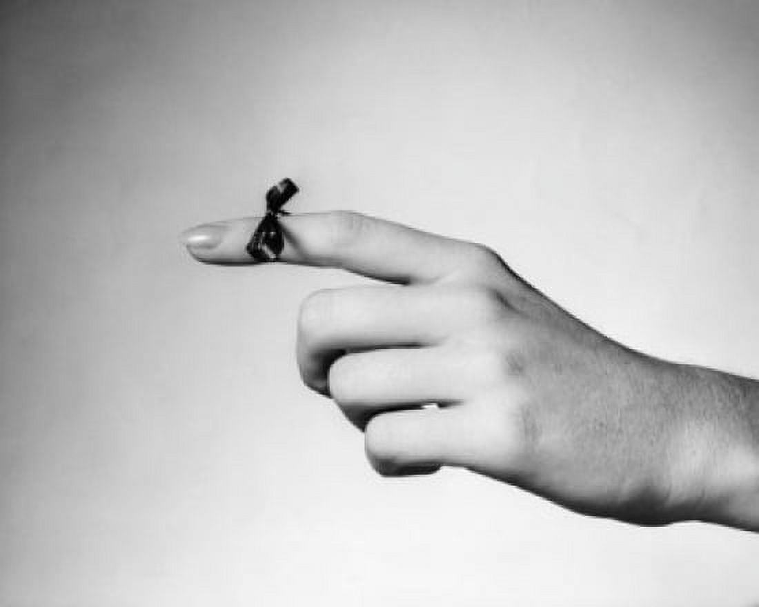 Close-up of a string tied on the index finger of a woman Canvas Art - (24 x 36)