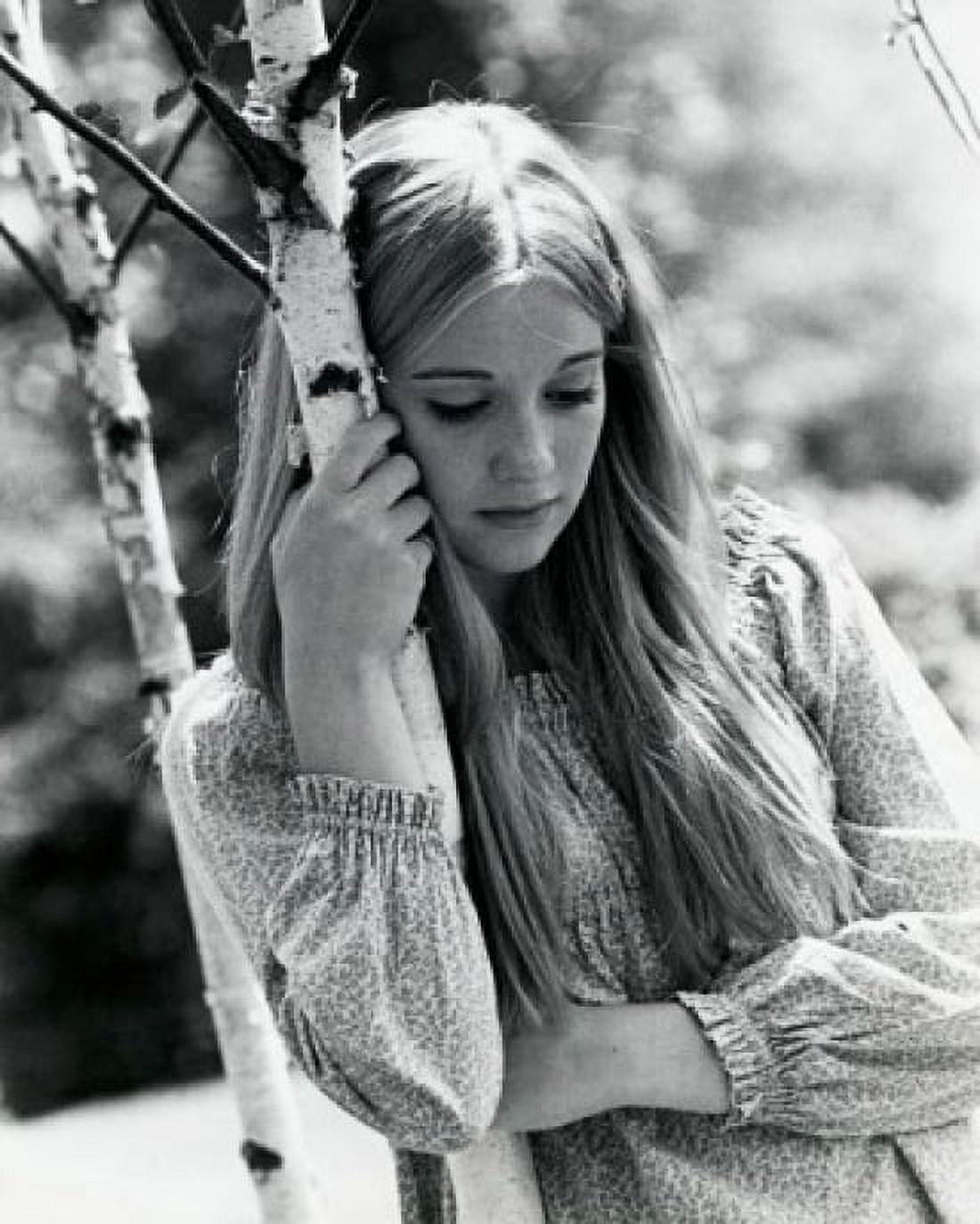 Close-up of a teenage girl holding a tree trunk thinking Canvas Art - (18 x 24)