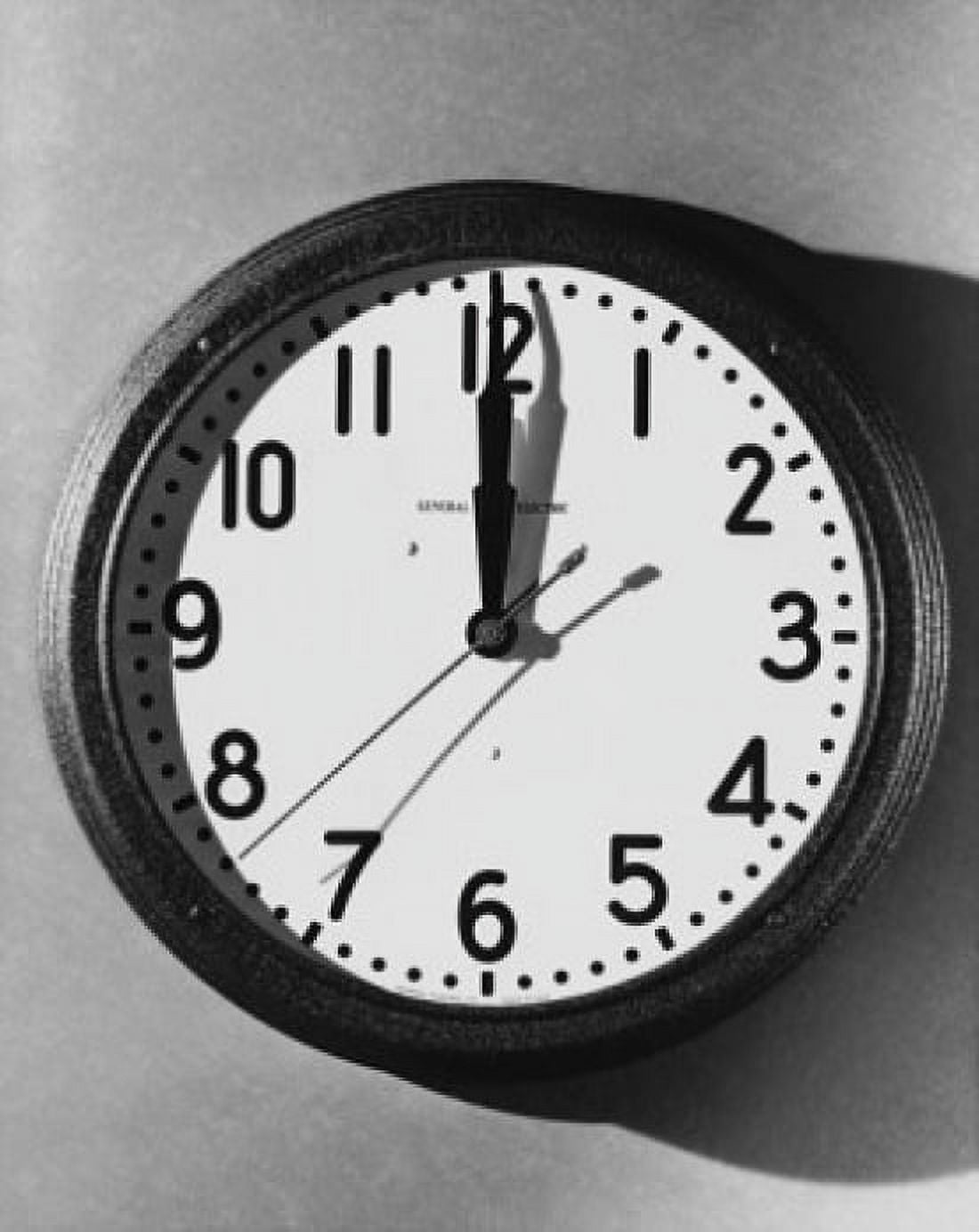 Close-up of a wall clock hanging on a wall Canvas Art - (18 x 24)