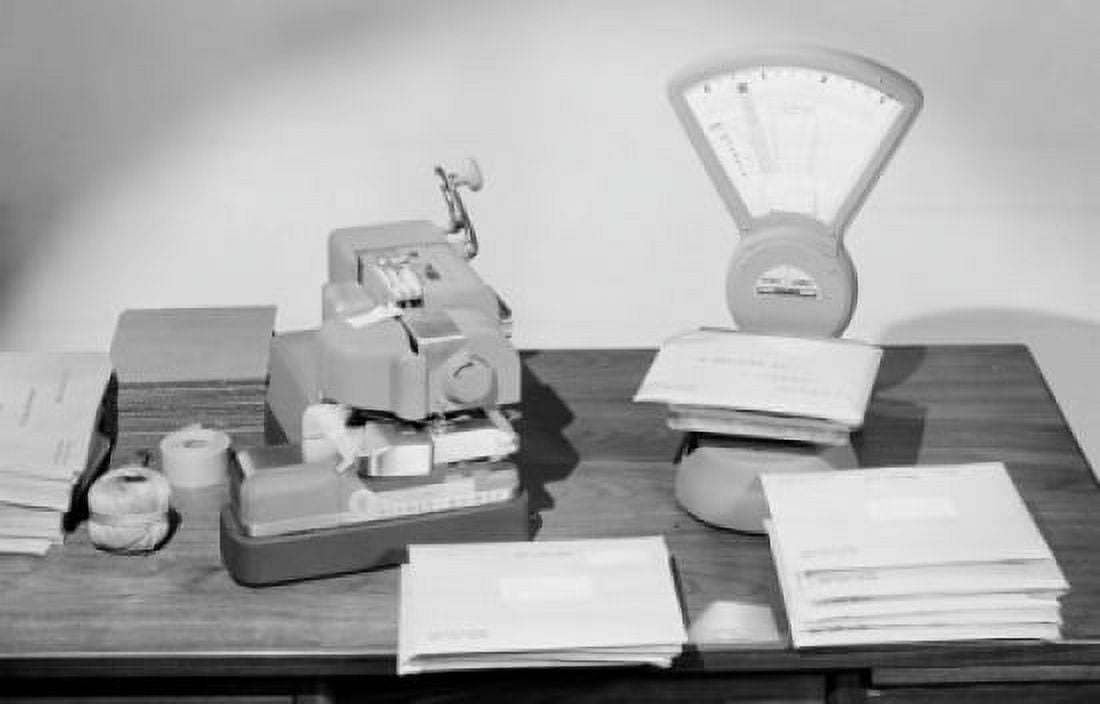Close-up of a weight scale and postage meter machine on a table Canvas Art - (24 x 36)