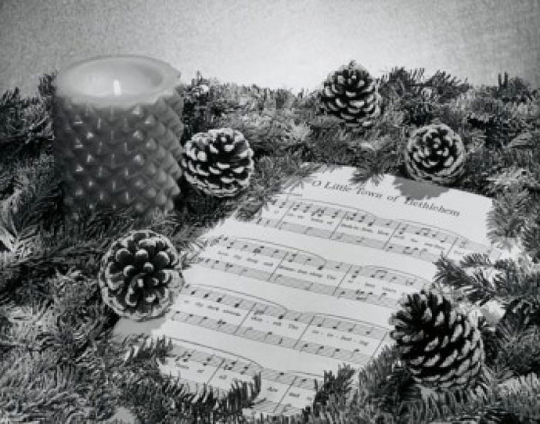 Close-up of a wreath with a burning candle on sheet music Canvas Art - (18 x 24)