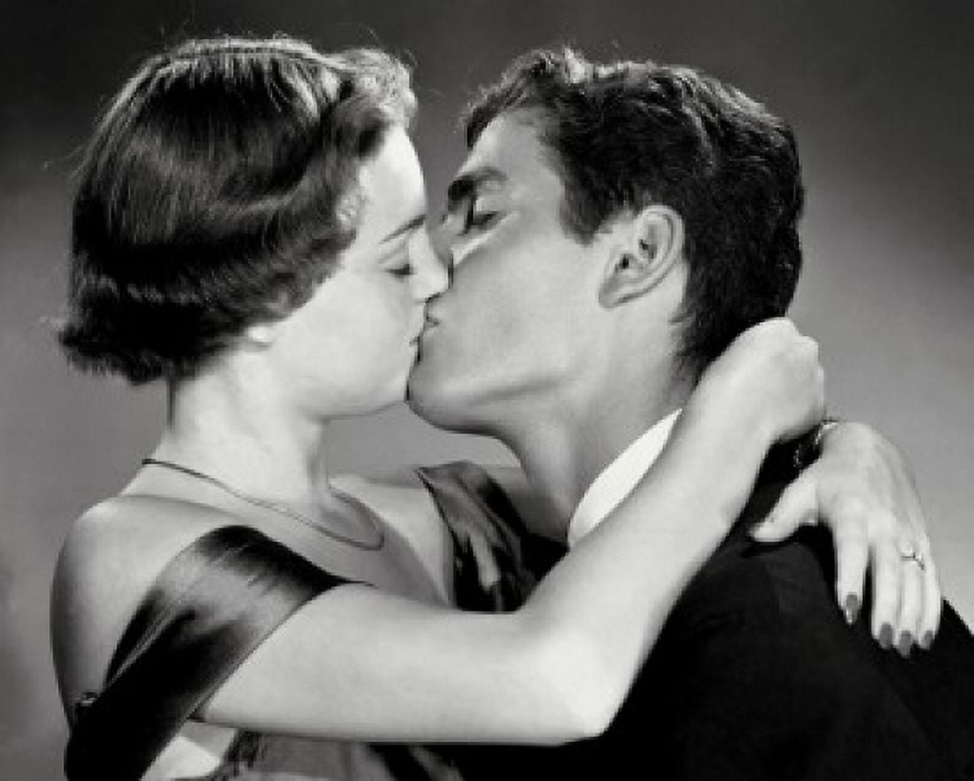 Close-up of a young couple kissing Canvas Art - (18 x 24)