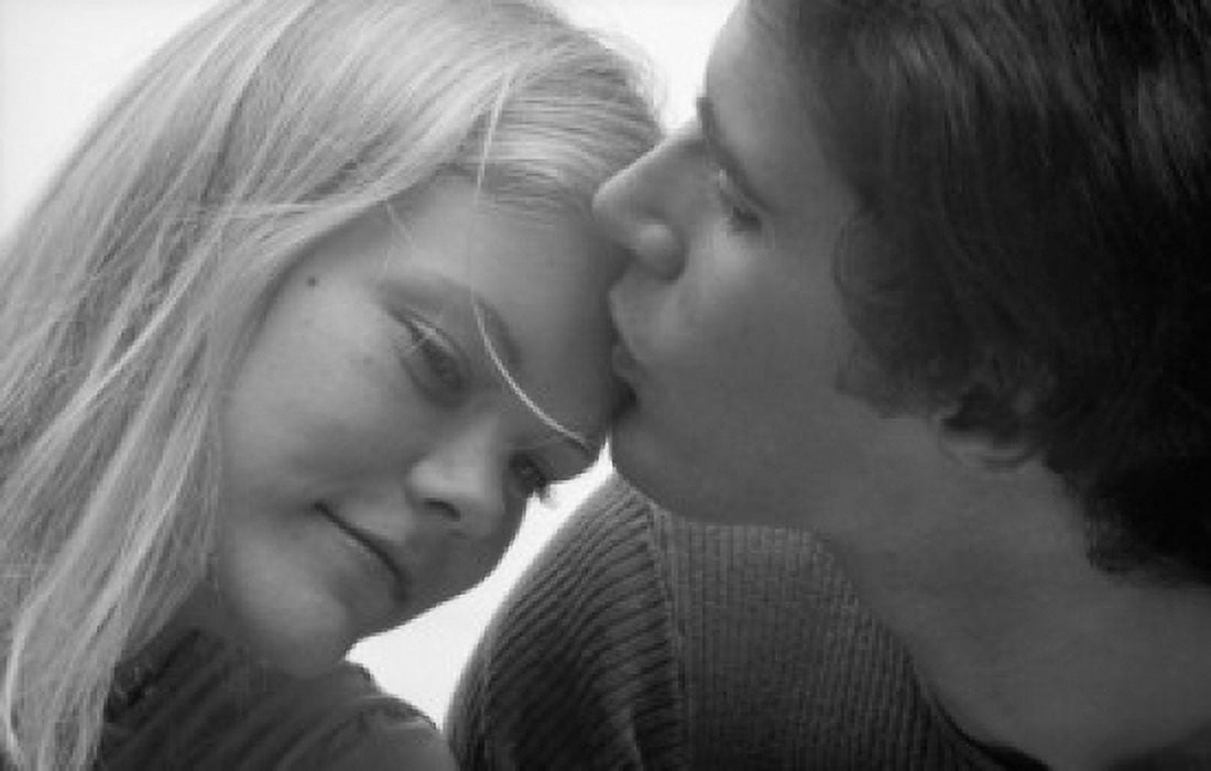 Close-up of a young man kissing a young womans forehead Canvas Art - (18 x 24)