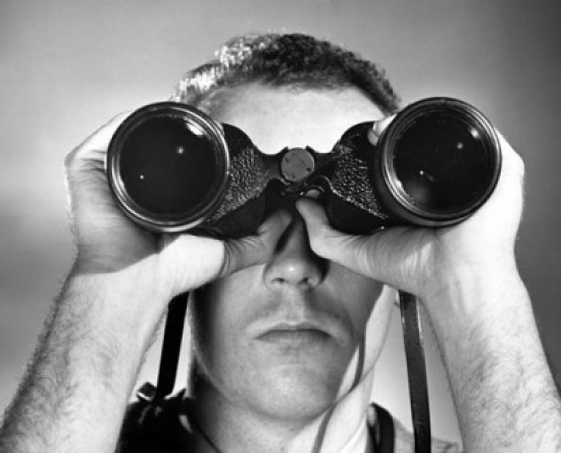 Close-up of a young man looking through binoculars Canvas Art - (18 x 24)