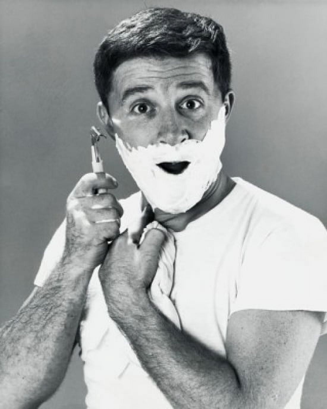 Close-up of a young man shaving Canvas Art - (18 x 24)