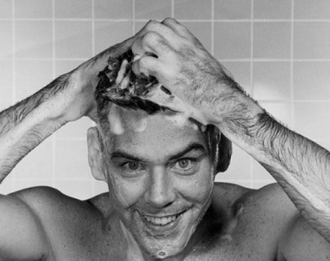 Close-up of a young man washing his hair Canvas Art - (24 x 36)
