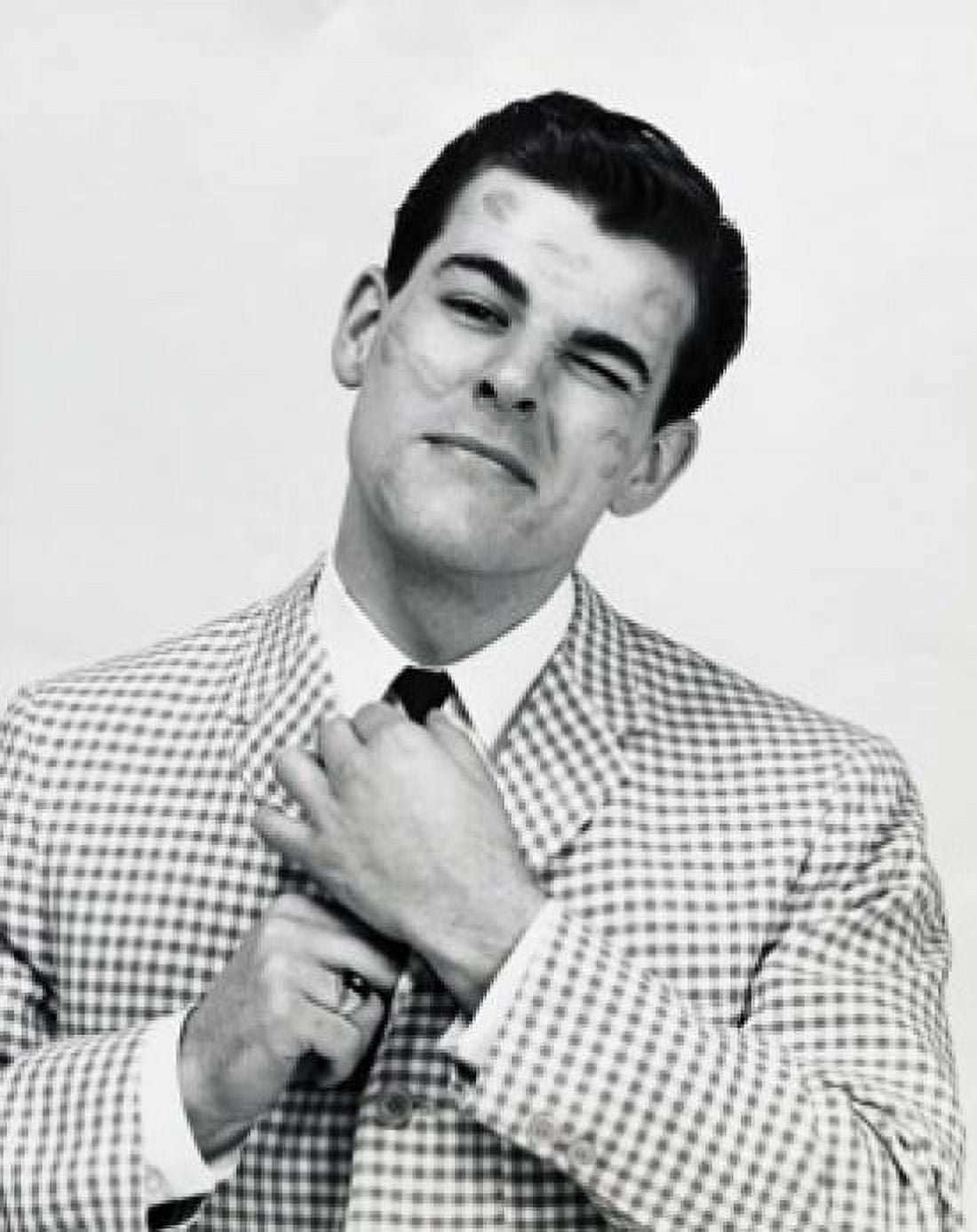 Close-up of a young man with lipstick kisses on his face adjusting his tie Canvas Art - (24 x 36)