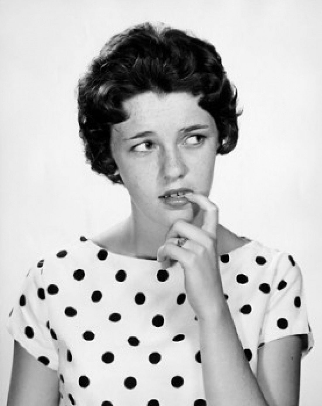 Close-up of a young woman biting her nails Canvas Art - (18 x 24)