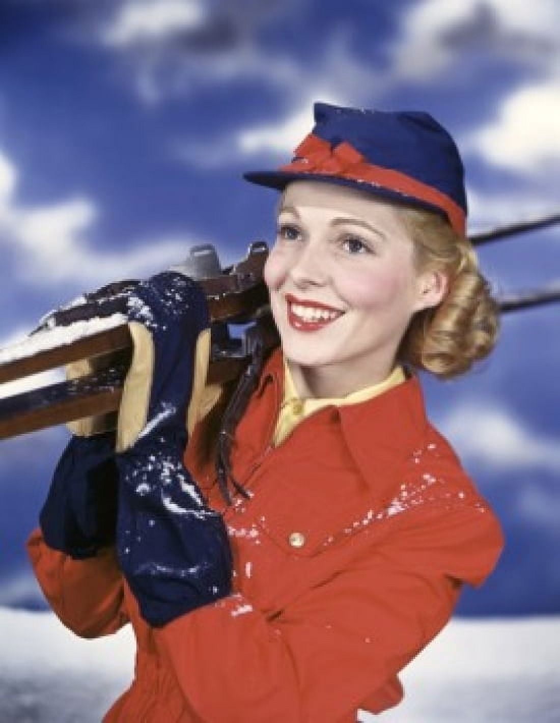 Close-up of a young woman carrying skis on her shoulder Canvas Art - (24 x 36)