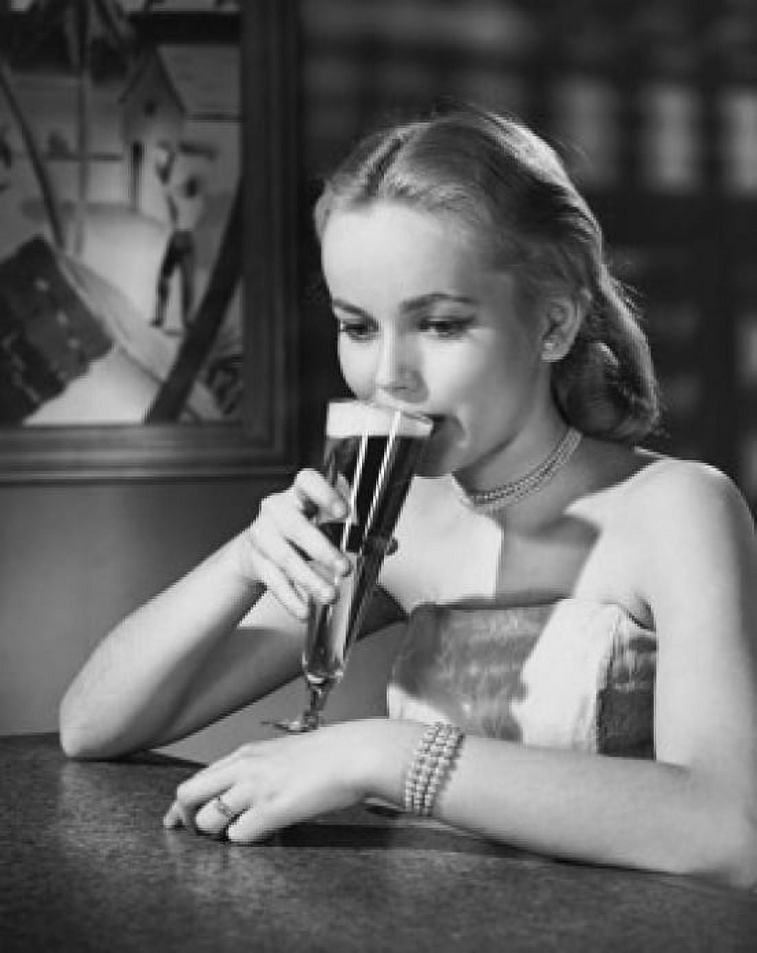 Close-up of a young woman drinking beer Canvas Art - (18 x 24)