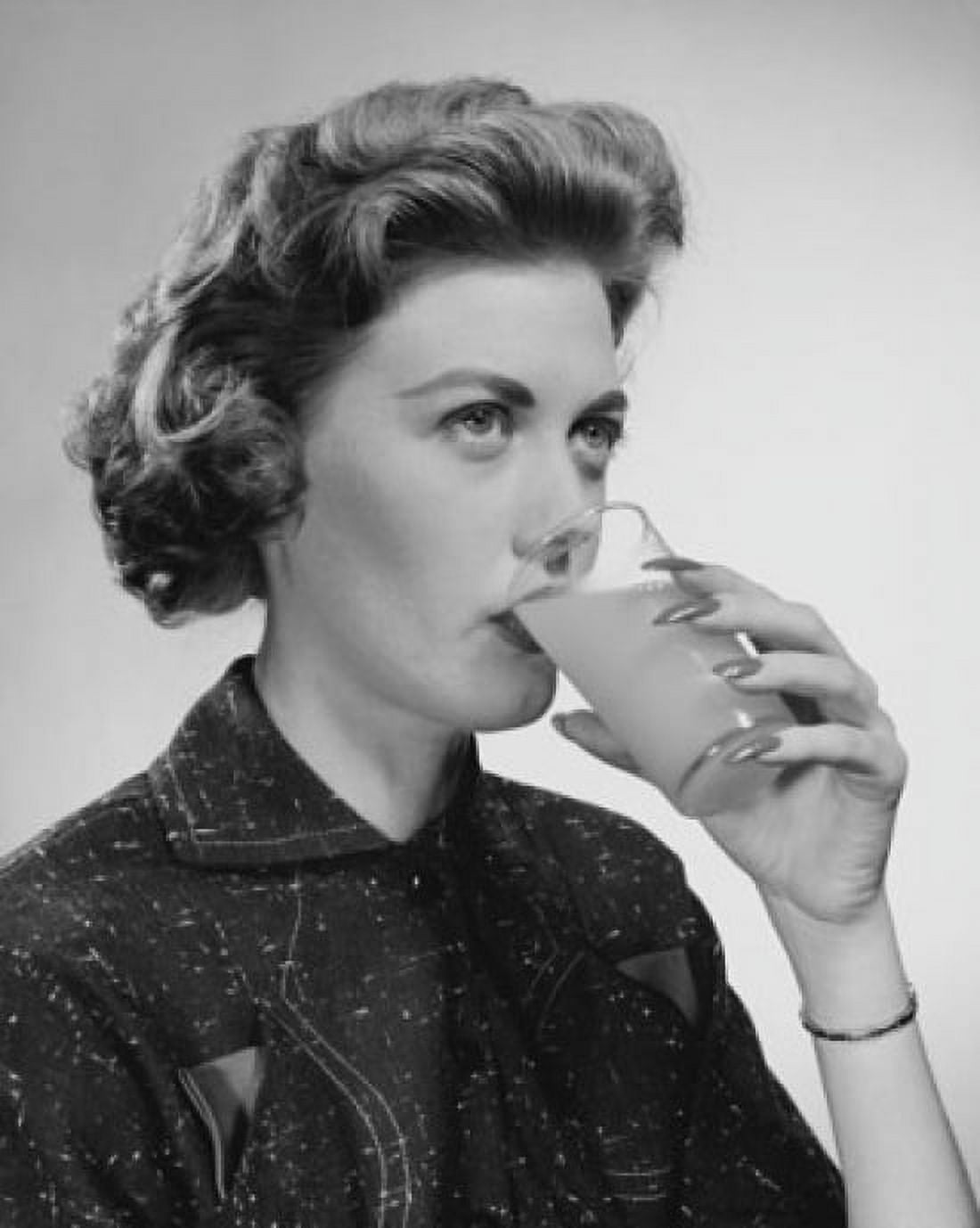Close-up of a young woman drinking juice Canvas Art - (18 x 24)